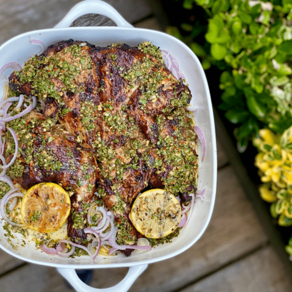 Char grilled spiced spatchcock chicken drizzled with garlic chilli herb oil