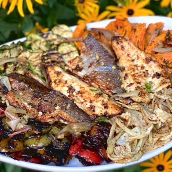 Crispy Garlic Sea Bass On a bed of Freekeh and Grilled Vegetables