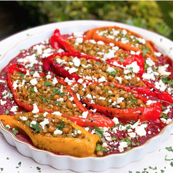 Baked Stuffed Peppers With Rice & Chickpeas in a Spicy Harissa Tomato Sauce Sprinkled with Feta